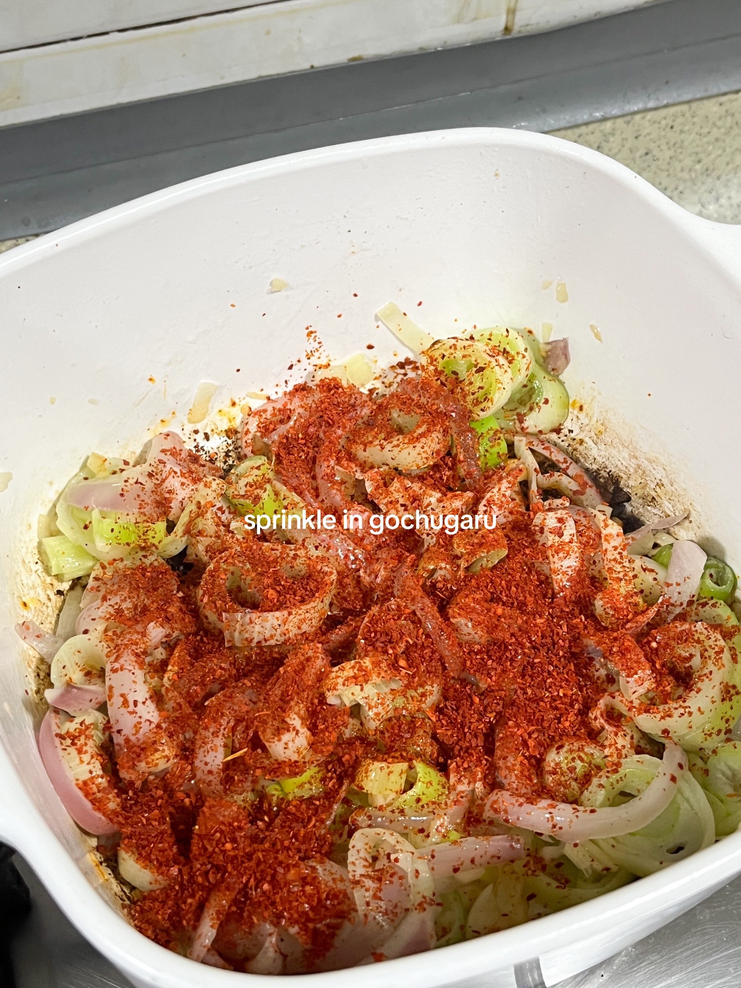 Make kimchi jjigae with me: Korean spicy tofu soup recipe using anchovies, kombu broth, scallions, onions and garlic