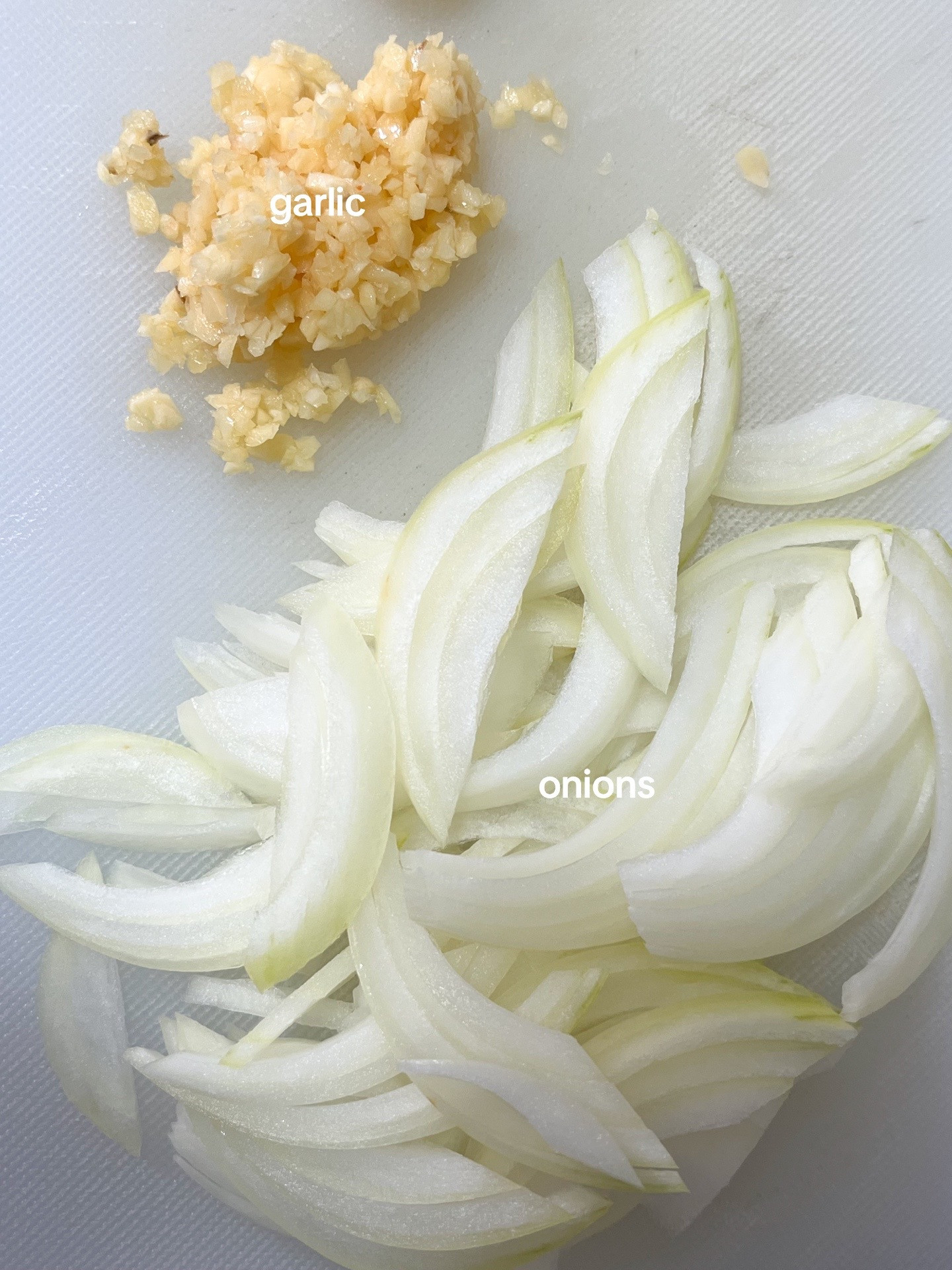 Make Rosé Mafaldine Pasta with Creamy Tomato Sauce, Garlic and Onions