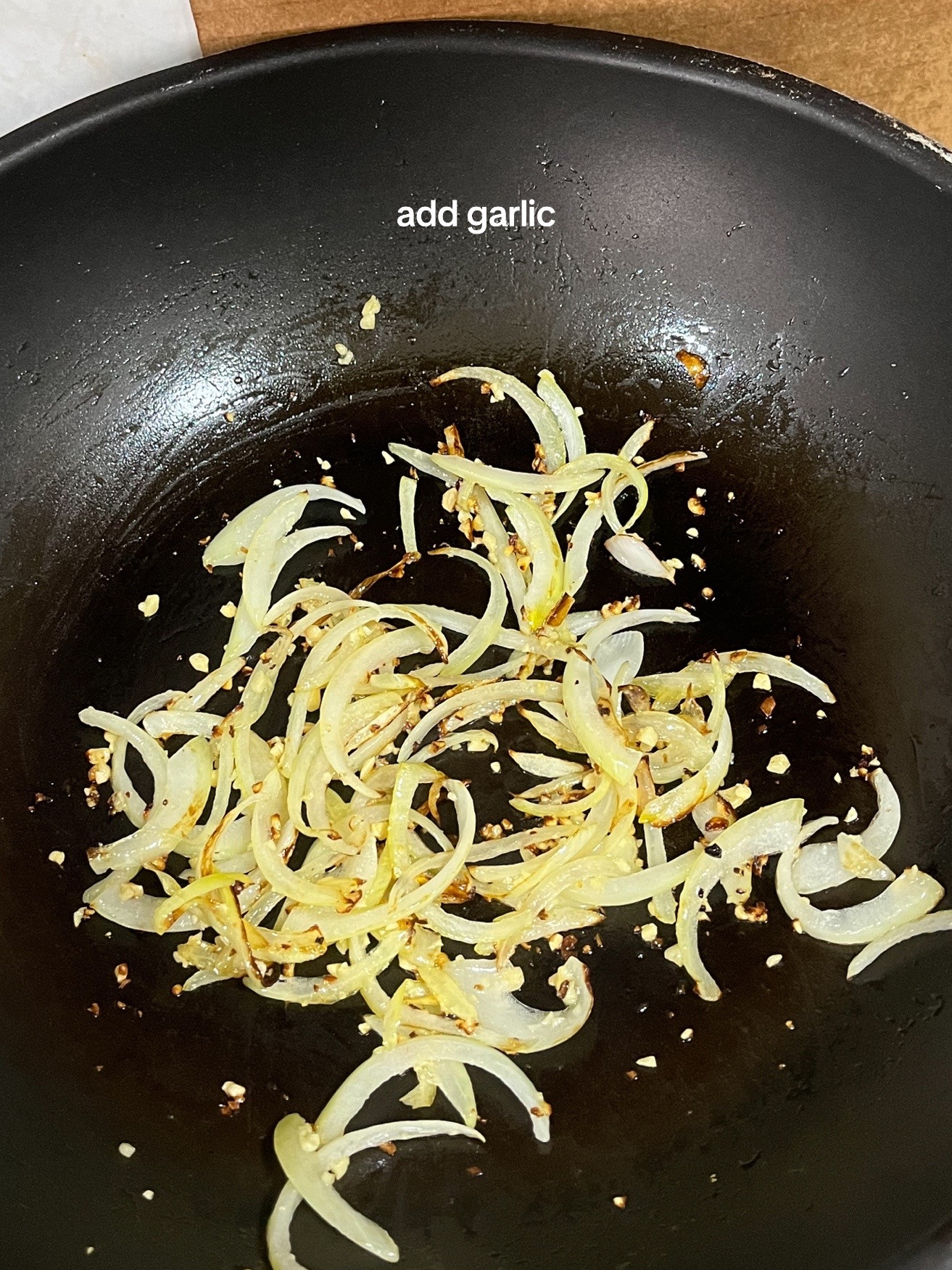 Make Rosé Mafaldine Pasta with Creamy Tomato Sauce, Garlic and Onions