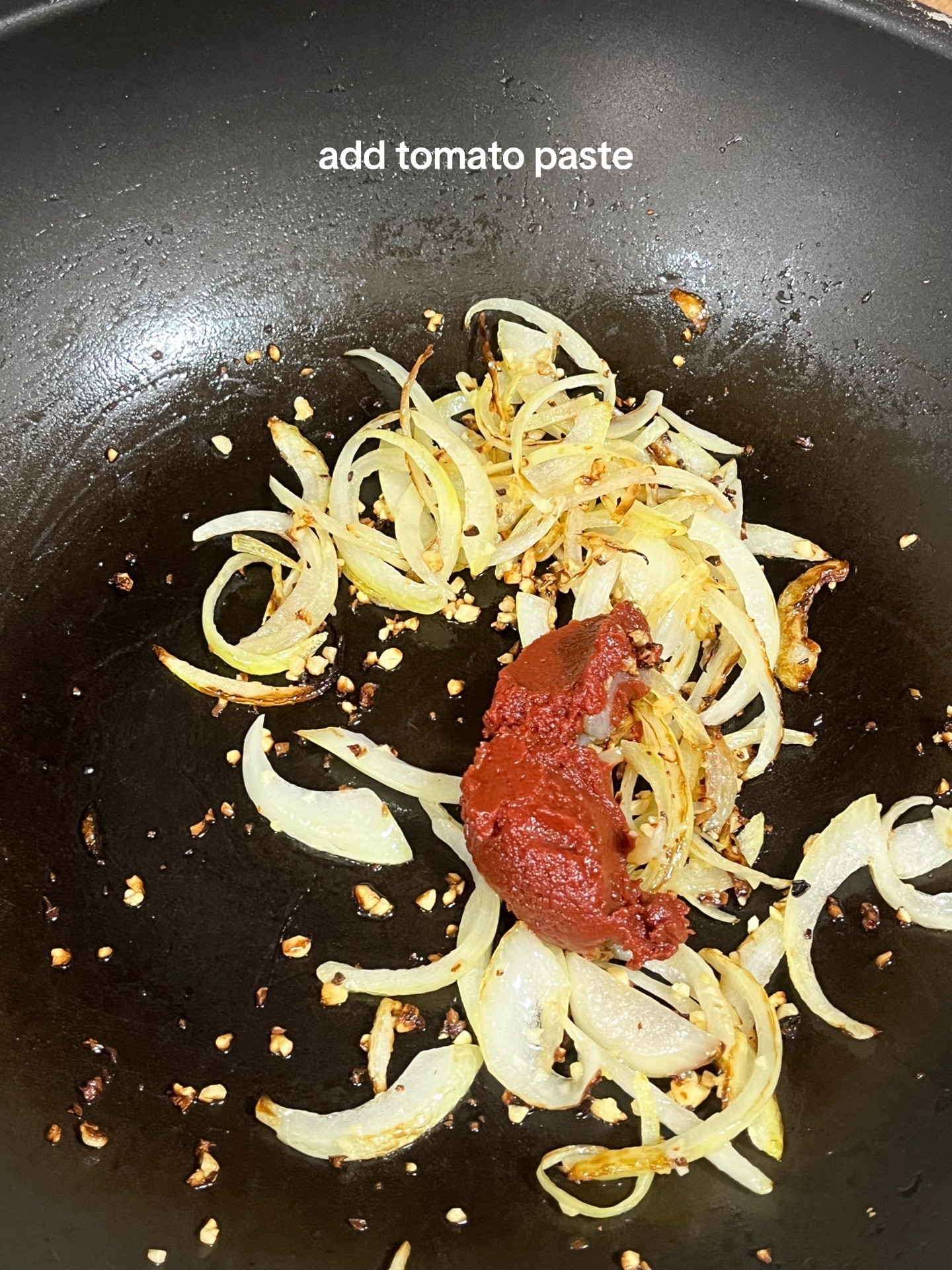 Make Rosé Mafaldine Pasta with Creamy Tomato Sauce, Garlic and Onions