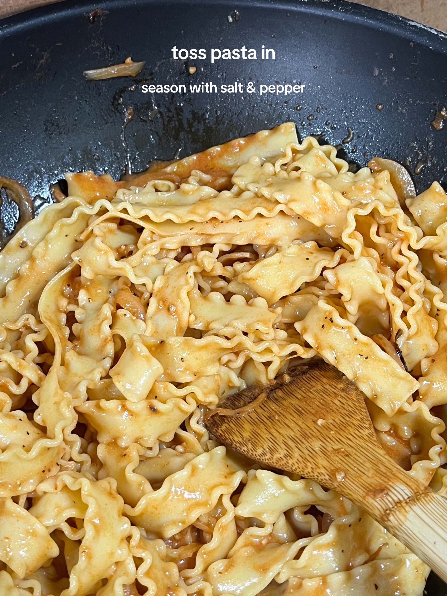 Make Rosé Mafaldine Pasta with Creamy Tomato Sauce, Garlic and Onions