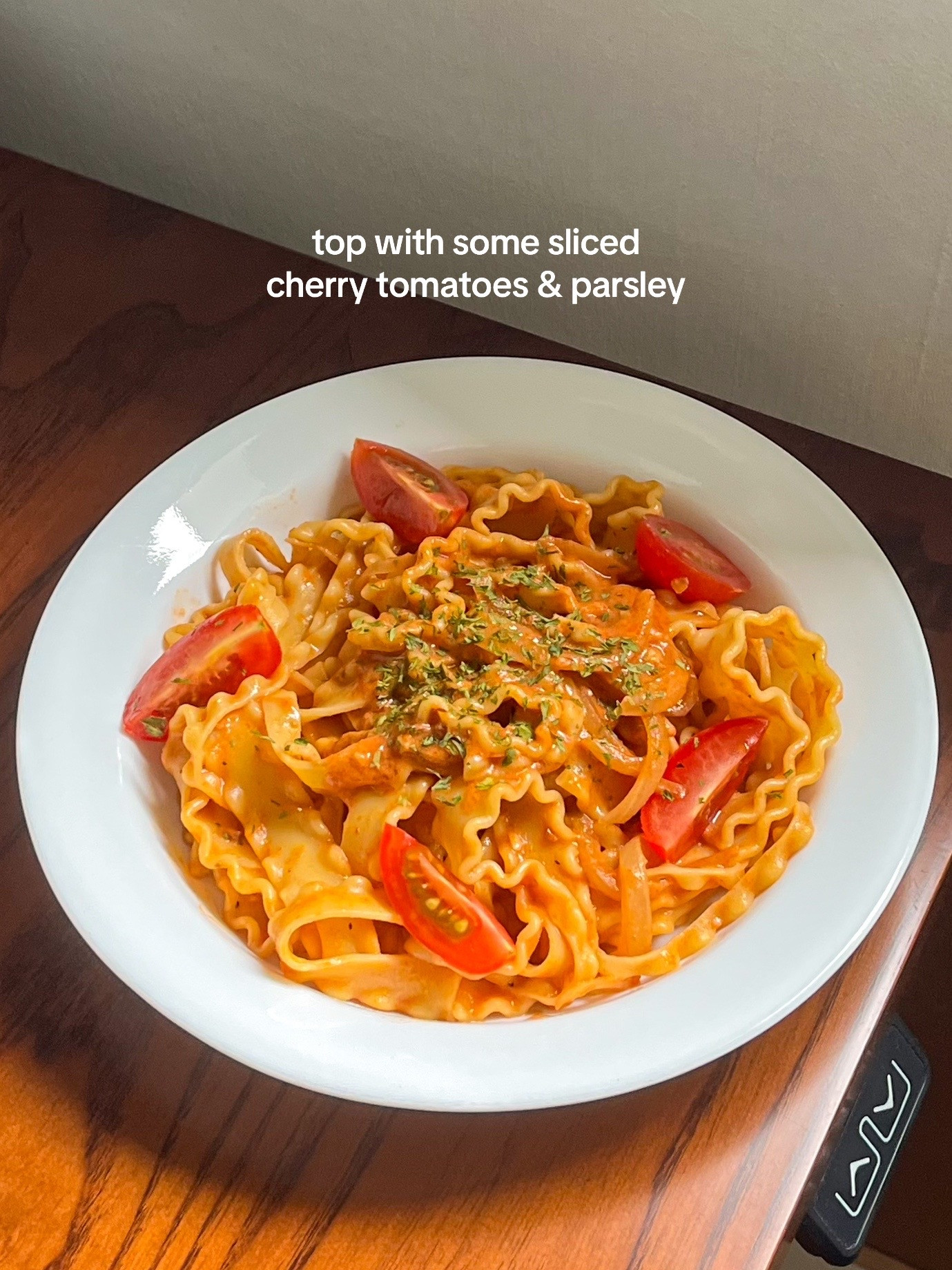 Make Rosé Mafaldine Pasta with Creamy Tomato Sauce, Garlic and Onions