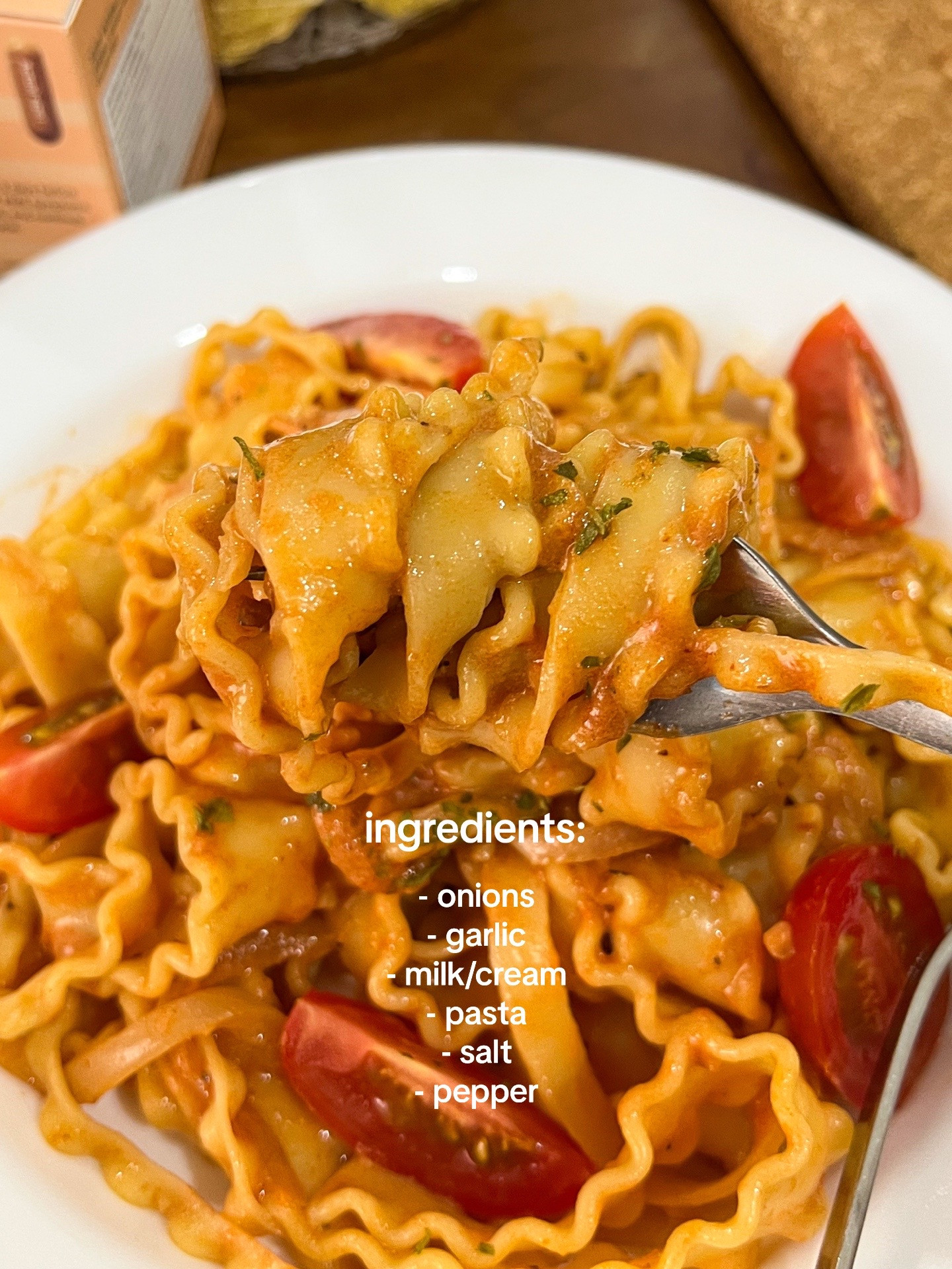 Make Rosé Mafaldine Pasta with Creamy Tomato Sauce, Garlic and Onions