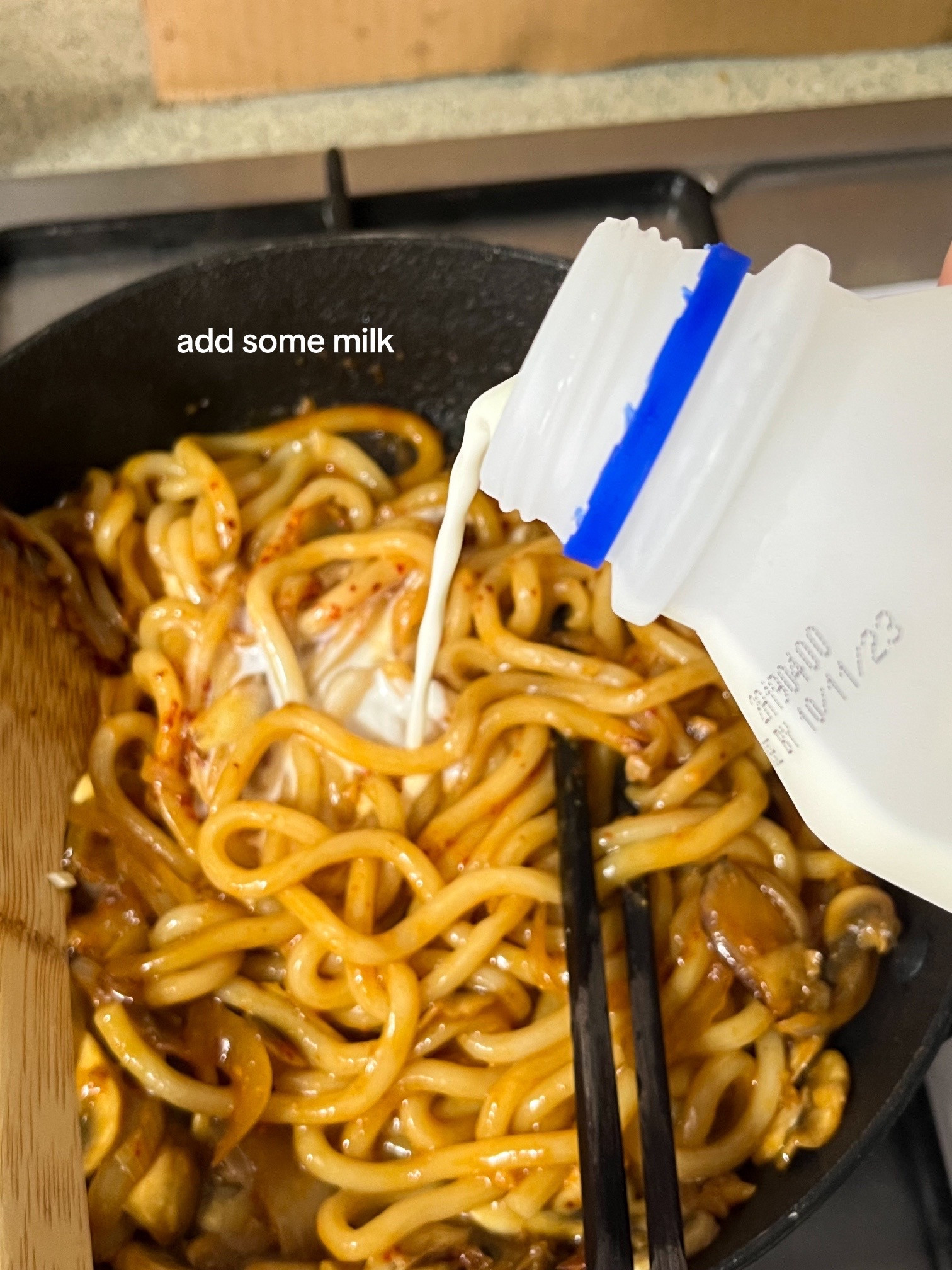 Miso Gochujang Udon Carbonara with mushrooms, onions and garlic