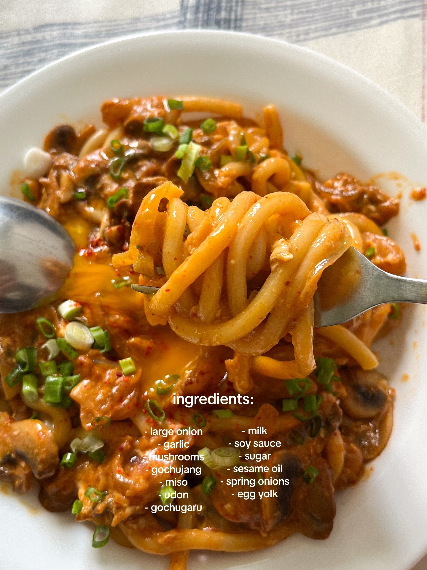 Miso Gochujang Udon Carbonara with mushrooms, onions and garlic