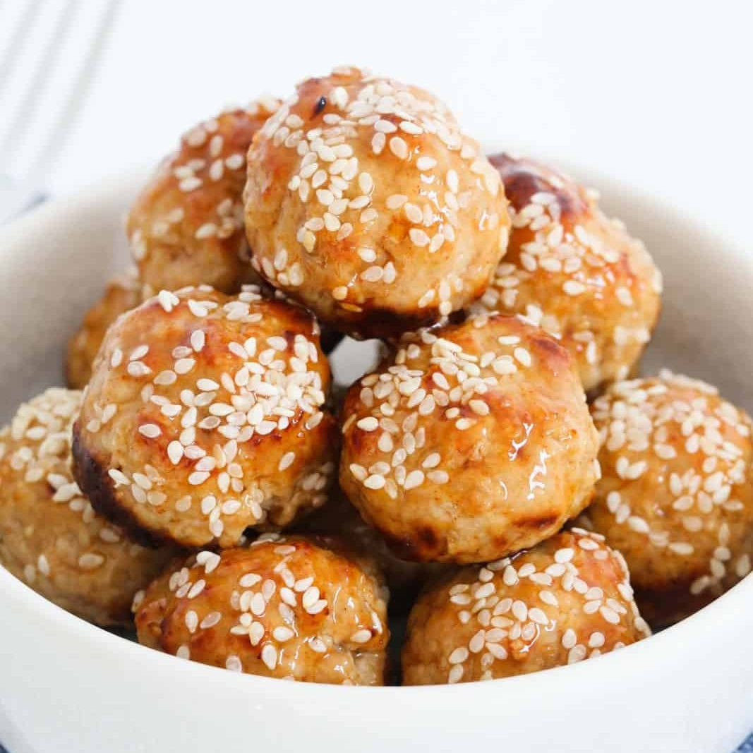 Oven Baked Thai Chicken Meatballs with Sweet Chilli Sauce and Sesame Seeds