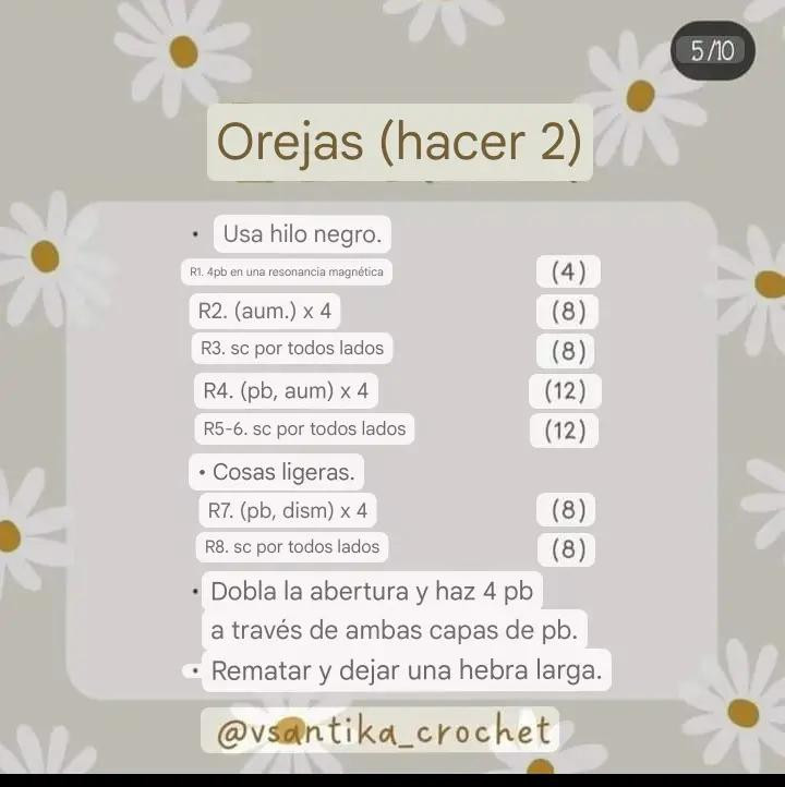 Patrón gratuito de crochet para perro amigurumi blanco y negro con ropa azul