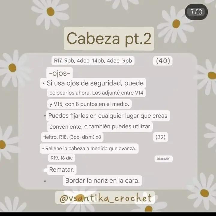 Patrón gratuito de crochet para perro amigurumi blanco y negro con ropa azul