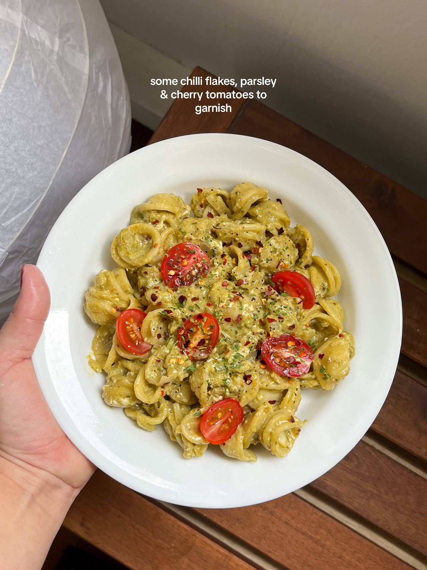 Quick and Easy Pesto Pasta Recipe with Garlic, Onions, and Cherry Tomatoes