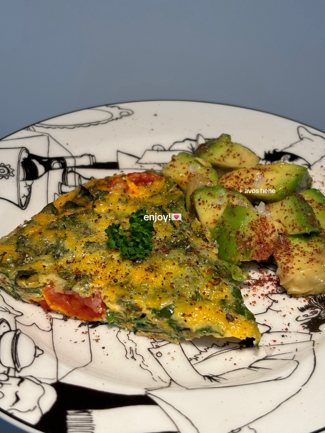 Quick, easy, healthy breakfast frittata with cherry tomatoes and greens cooked in Le Creuset cast iron skillet