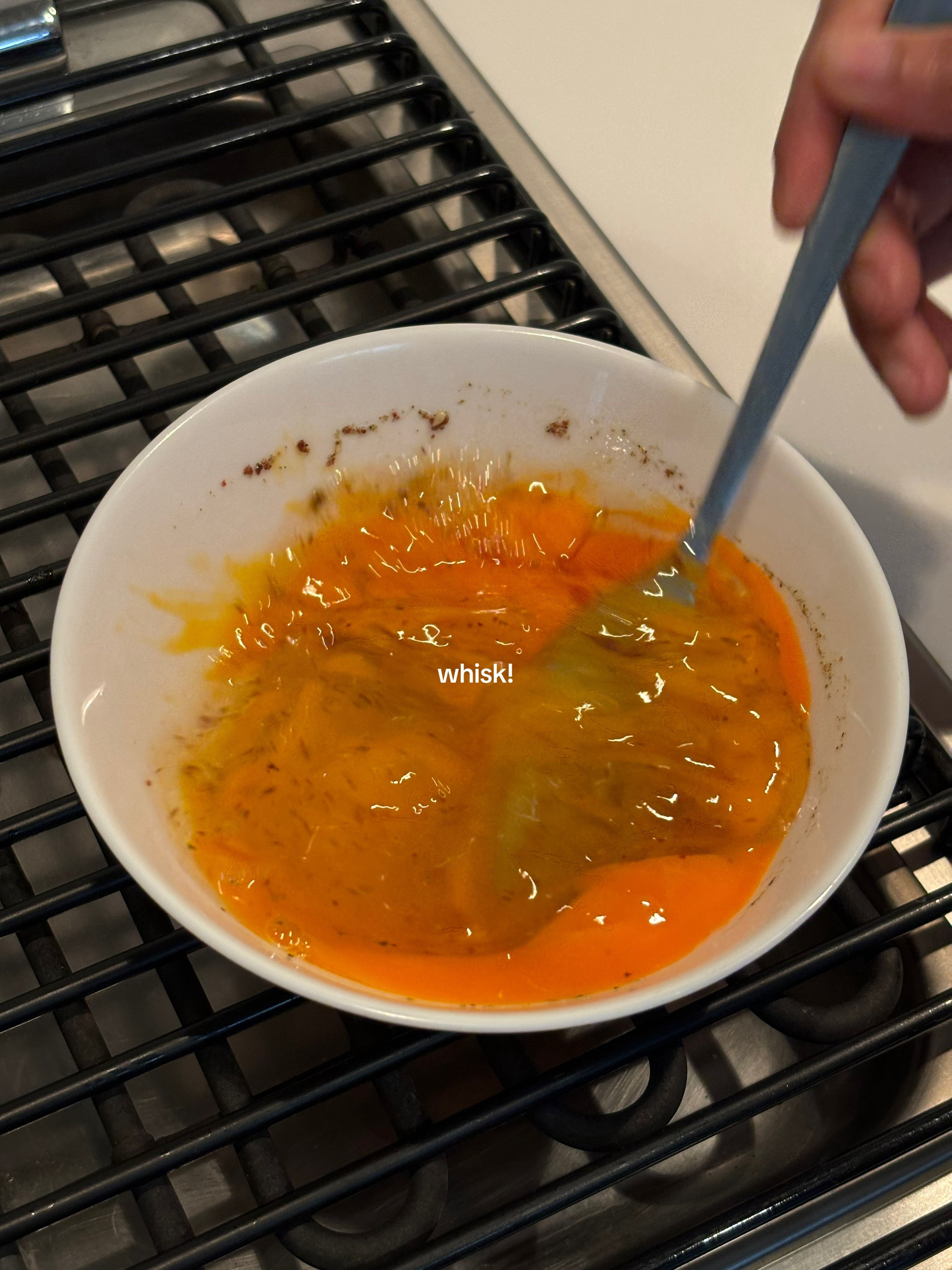 Quick, easy, healthy breakfast frittata with cherry tomatoes and greens cooked in Le Creuset cast iron skillet