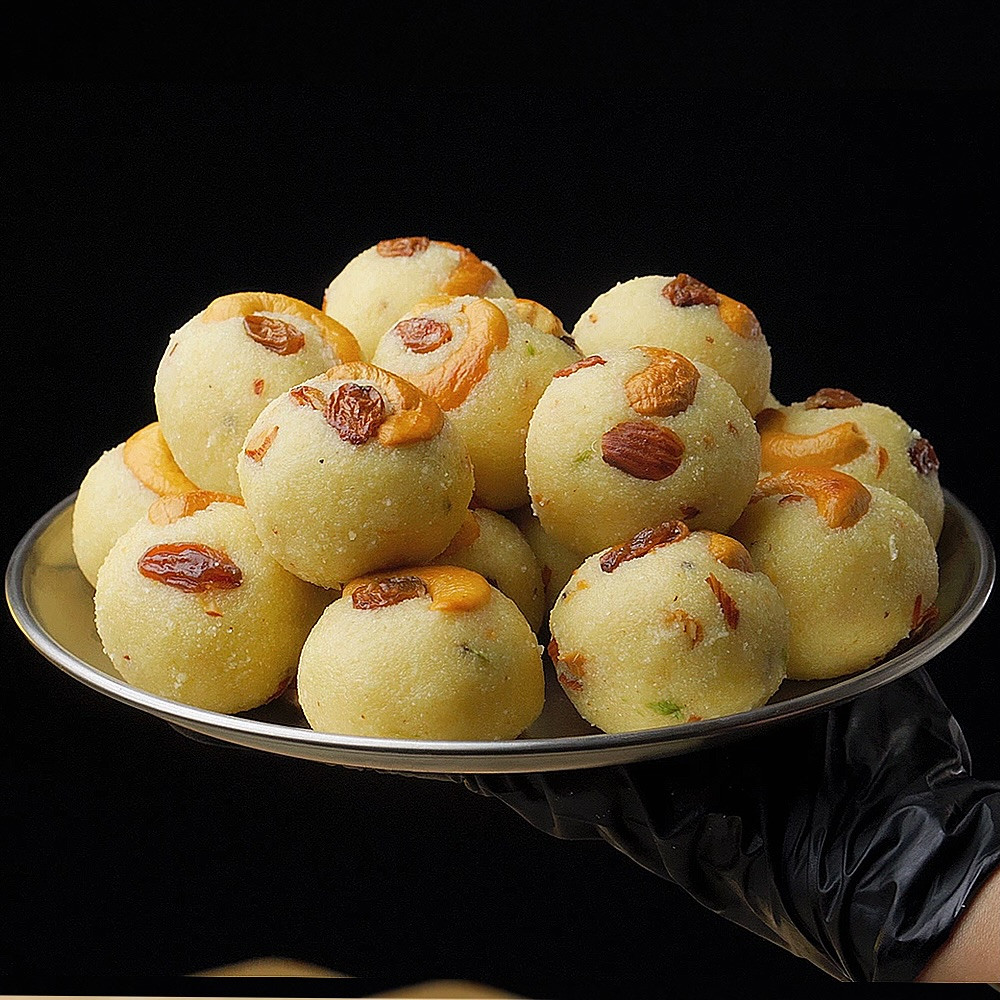 Soft & Delicious Rava Laddu Recipe with Cashews and Raisins - Easy Indian Sweet