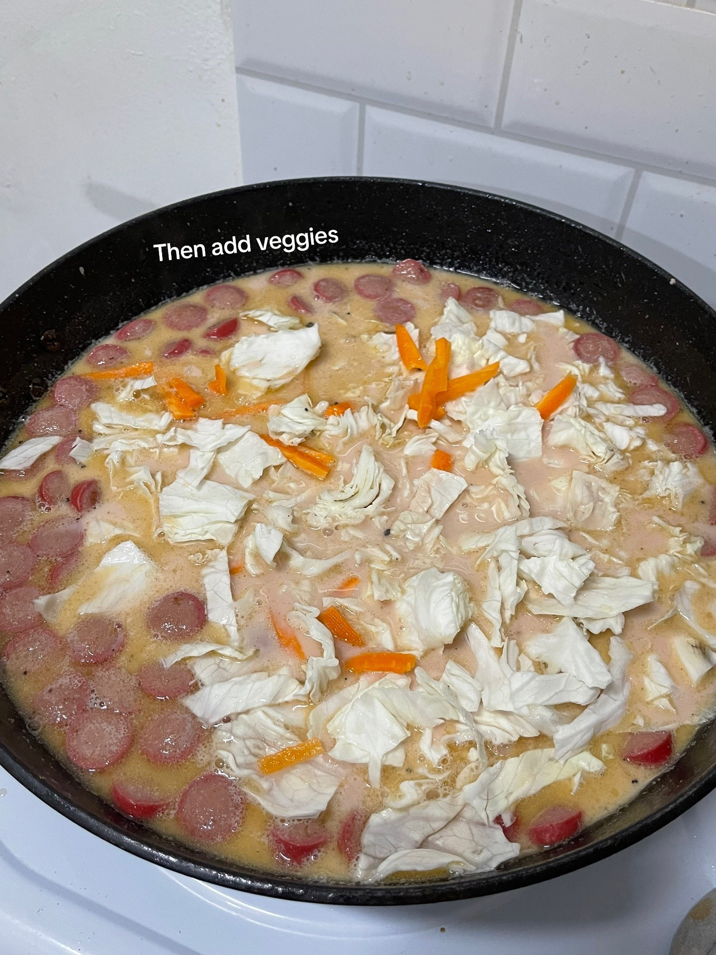Sopas: Creamy Filipino Noodle Soup with Chicken, Liver, Sausage, and Hard-Boiled Eggs