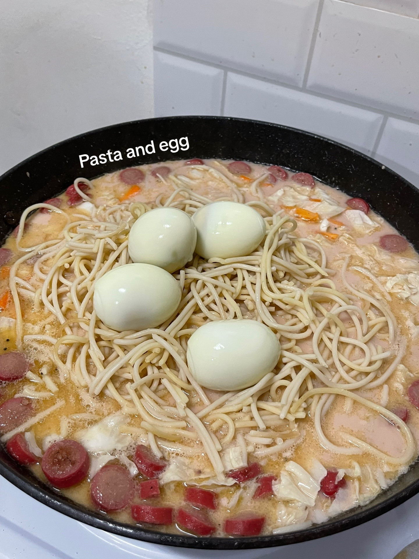 Sopas: Creamy Filipino Noodle Soup with Chicken, Liver, Sausage, and Hard-Boiled Eggs