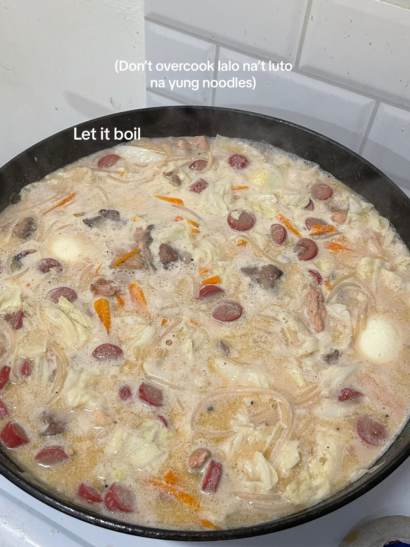 Sopas: Creamy Filipino Noodle Soup with Chicken, Liver, Sausage, and Hard-Boiled Eggs