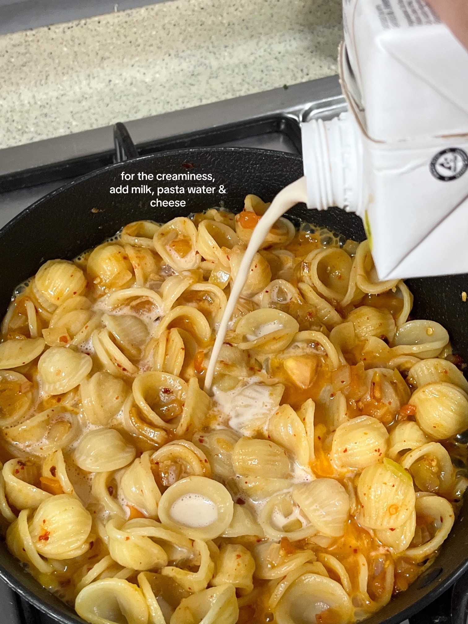 Spicy Tomato Cream Pasta Recipe: Diced onions, garlic, tomatoes