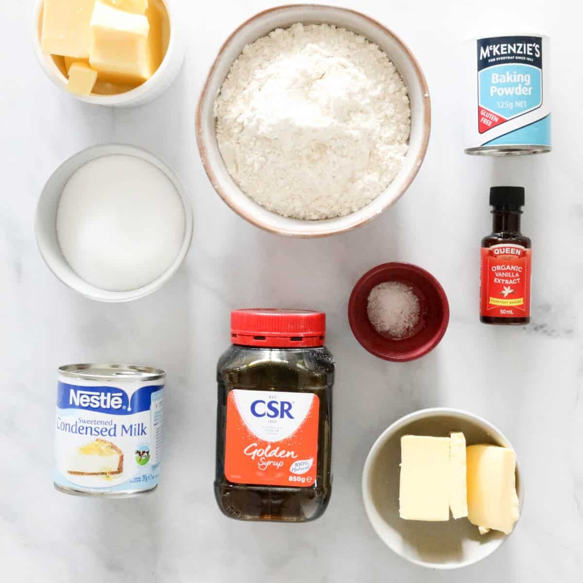 Tan Slice: Buttery Shortbread with Thick Caramel Filling and Crumbly Topping