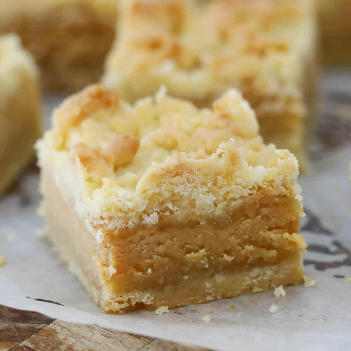 Tan Slice: Buttery Shortbread with Thick Caramel Filling and Crumbly Topping