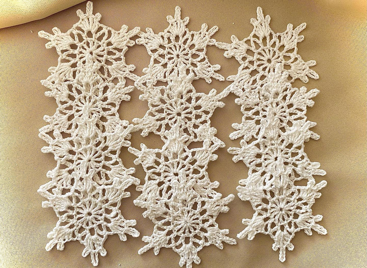 Crochet Snowflake Chart Pattern with Finished White Yarn Samples