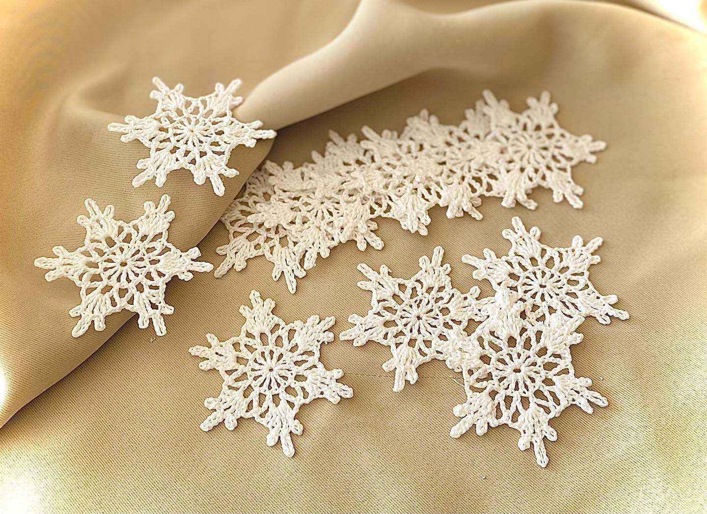 Crochet Snowflake Chart Pattern with Finished White Yarn Samples