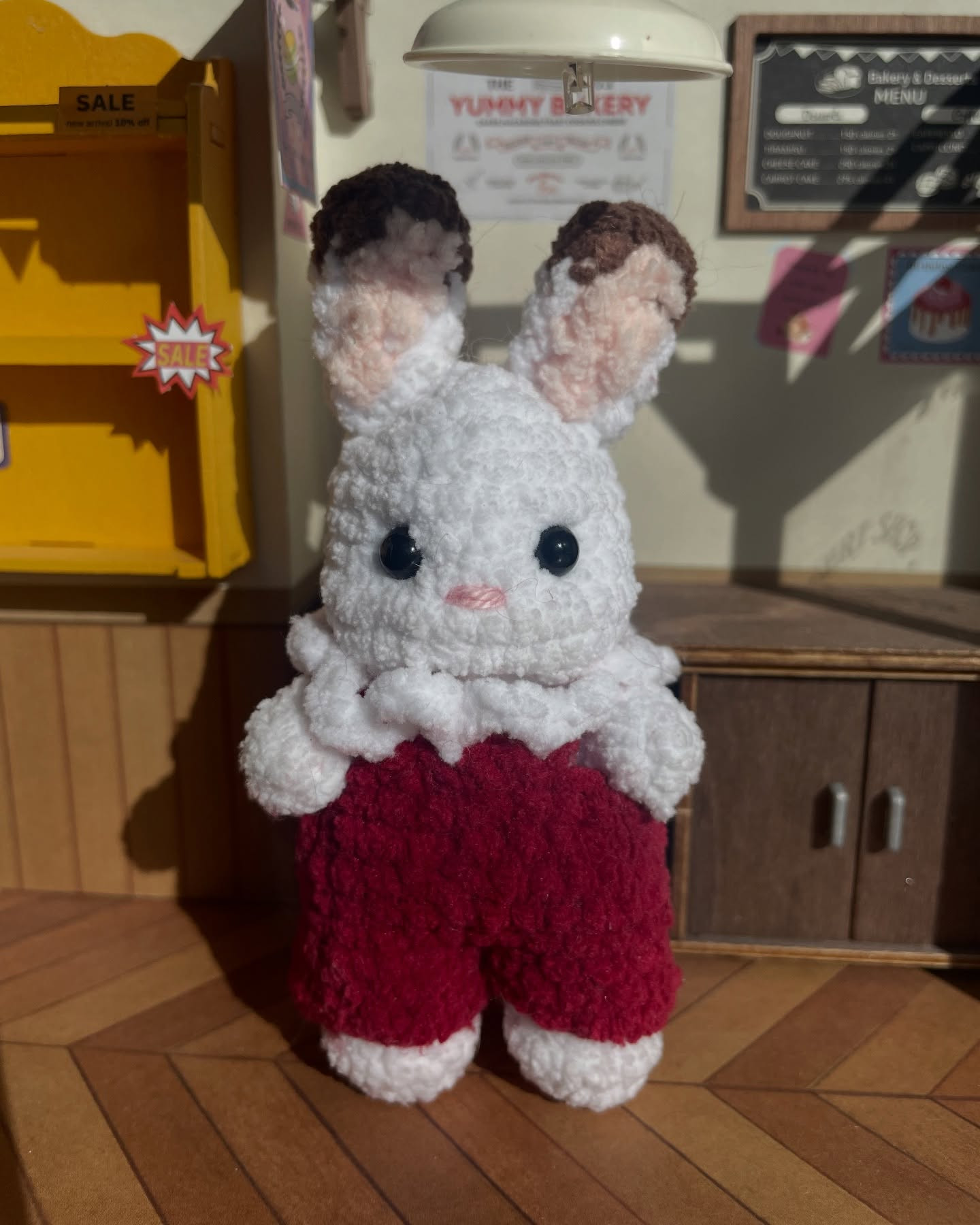 Free Crochet Pattern: Baby Bunny Amigurumi with Green Jumper by Conakboo