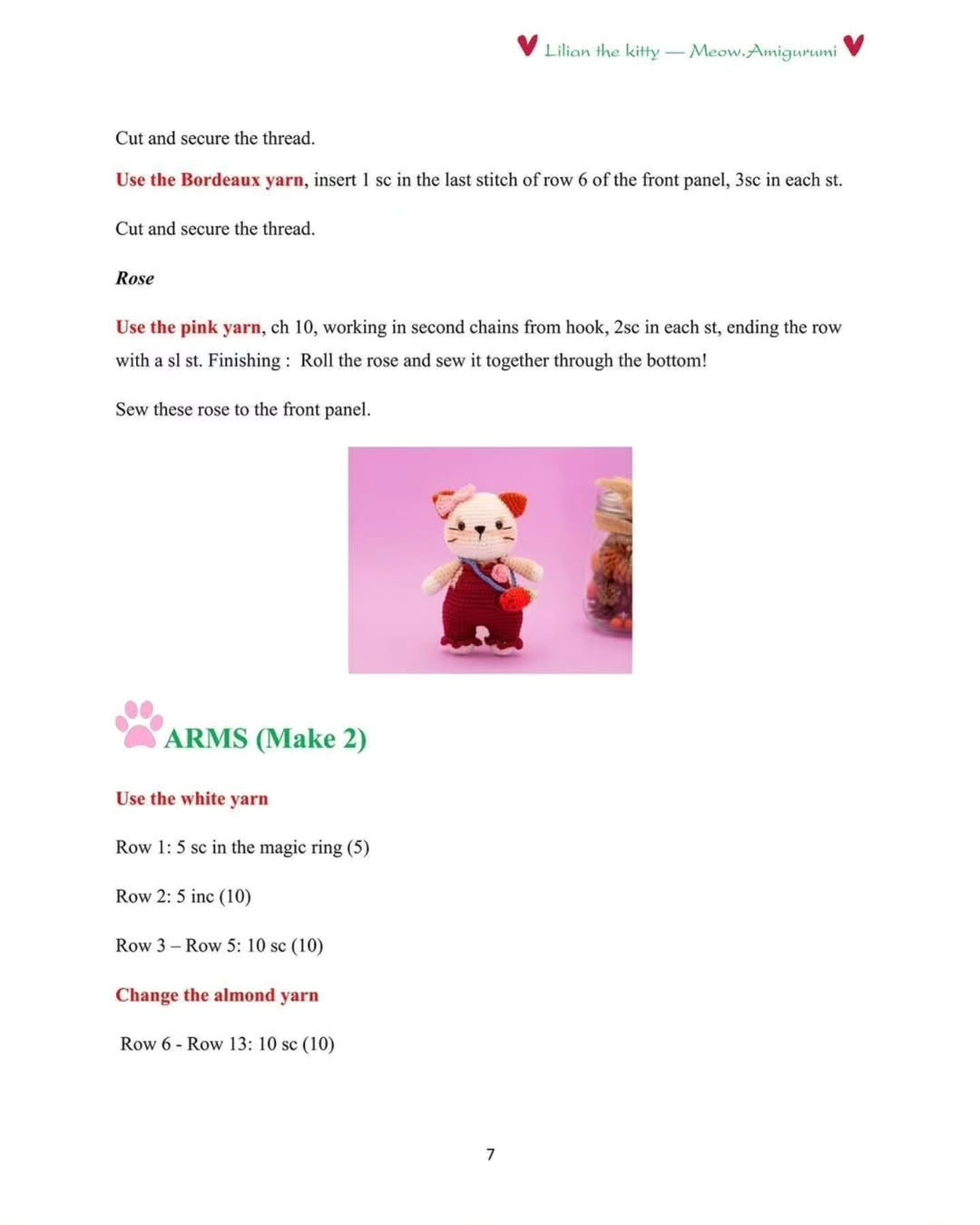 Free Crochet Pattern: Lilian the Kitty Amigurumi with Red Overalls and Strawberry Bag