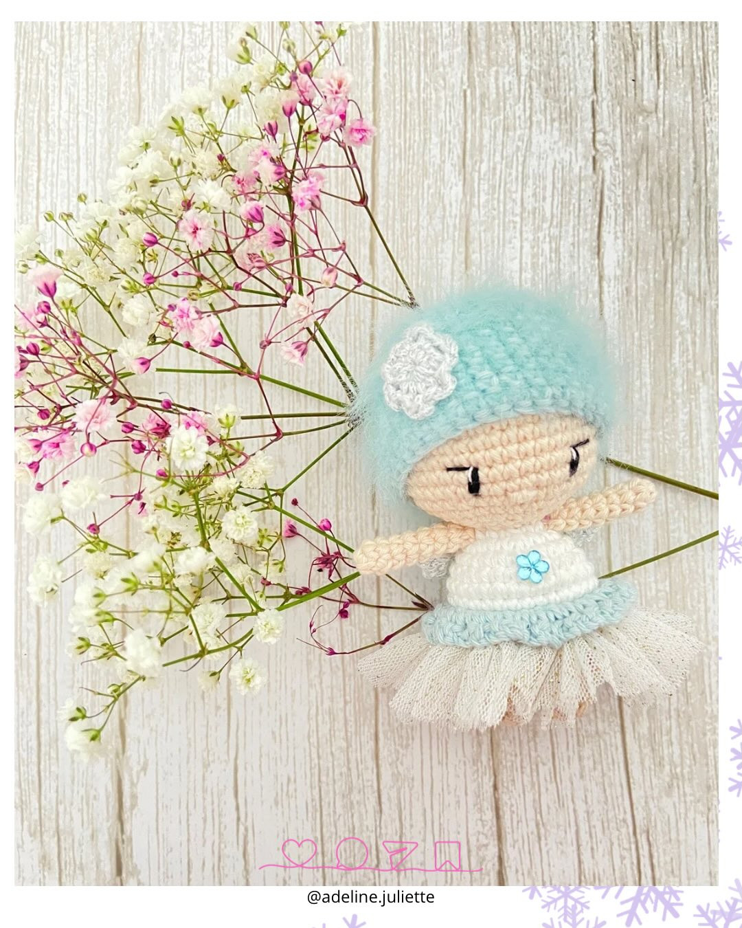 Free Crochet Pattern: Winter Fairy Amigurumi Doll with Blue Hat and Flower Bouquet