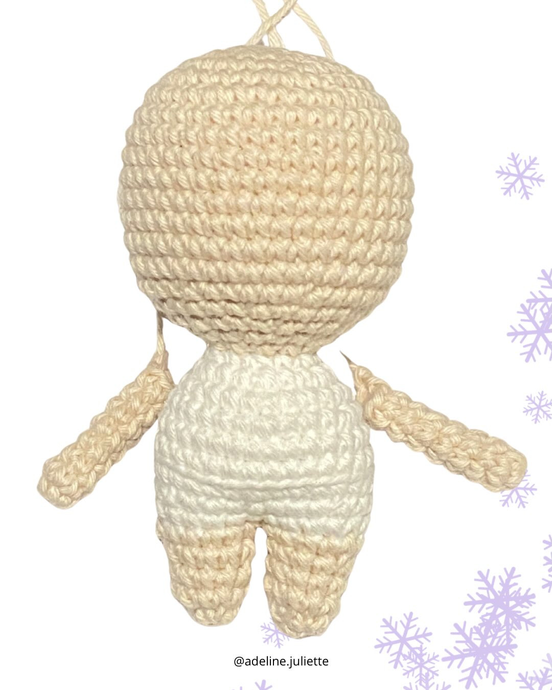 Free Crochet Pattern: Winter Fairy Amigurumi Doll with Blue Hat and Flower Bouquet
