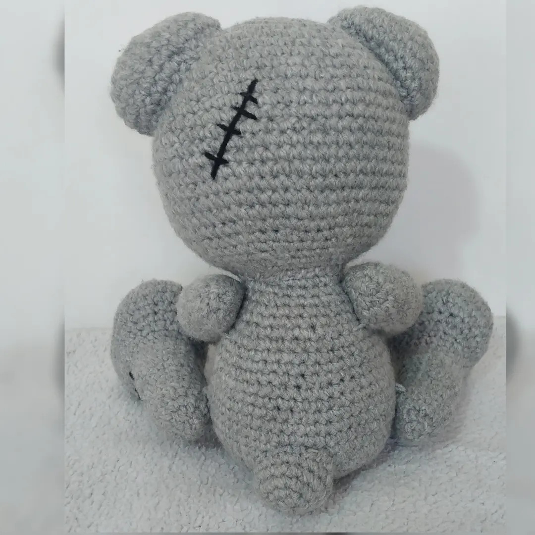 Gray Stitched Teddy Bear Crochet Pattern with Blue Nose and Heart