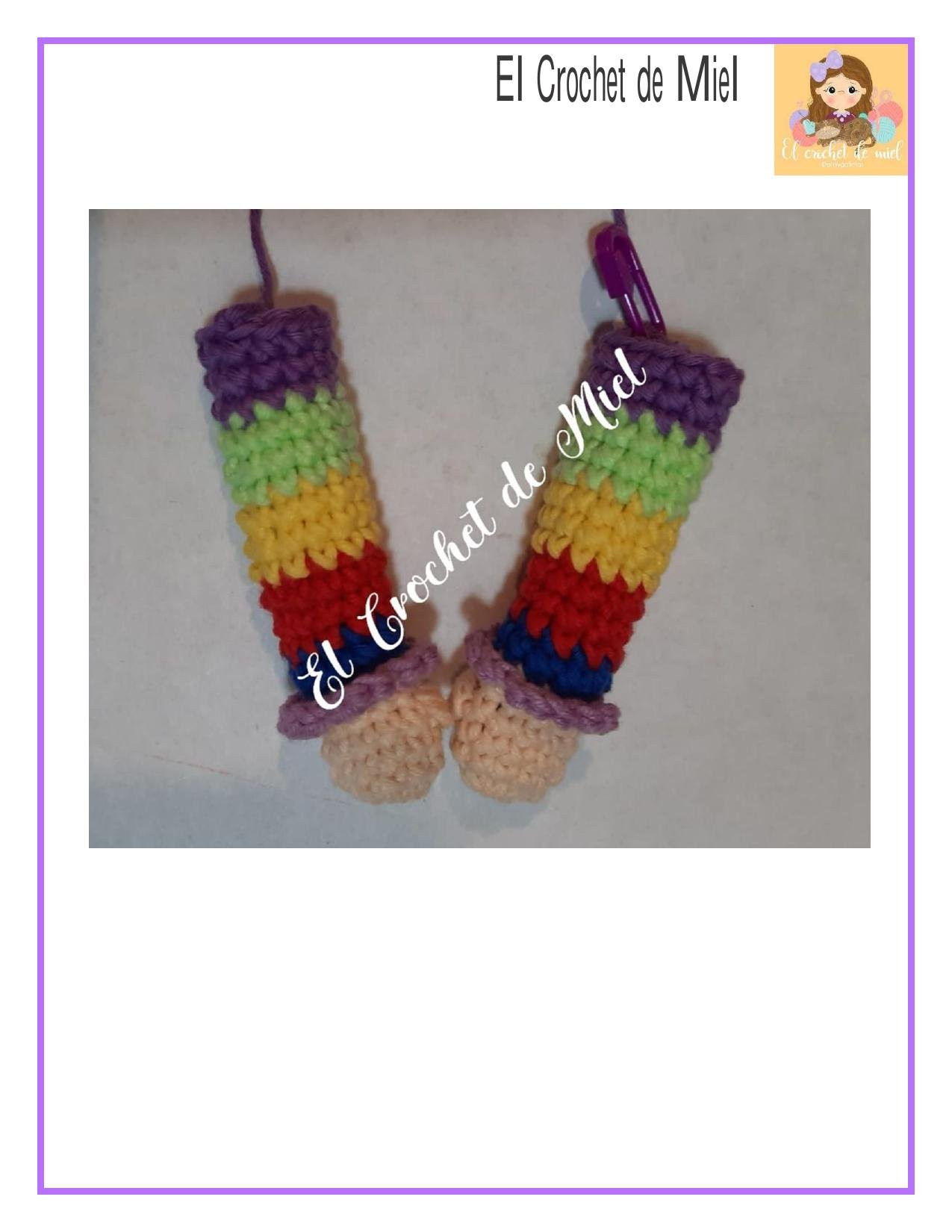 Patrón de Amigurumi Rainbow Brite con pelo rizado y vestido arcoíris