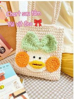 Chart móc len túi vịt đeo tay dễ thương với nơ xanh lá và má cam