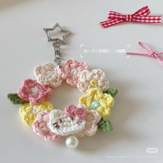 Chart vòng hoa Hello Kitty móc len pastel