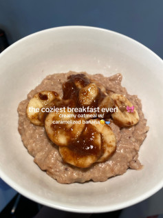Creamy oatmeal with caramelized banana, cinnamon, and warm milk