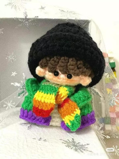 Crochet Amigurumi Boy Pattern with Rainbow Scarf and Green Sweater