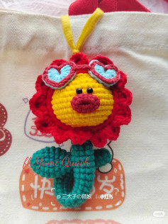 Crochet pattern for cute flower doll with sunglasses