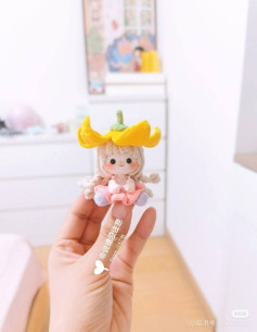 Crochet Pattern for Sitting Little Girl Amigurumi with Flower Hat