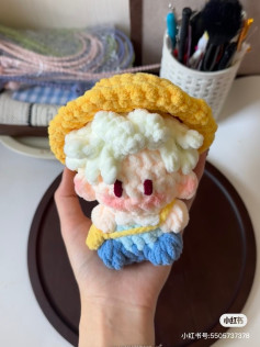 Cute Chibi Amigurumi Doll with Yellow Hat and Blue Pants