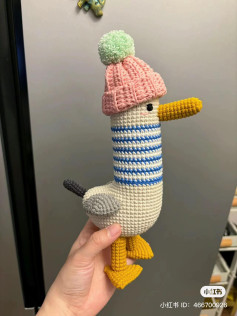 Cute Crocheted Penguin Doll with Pink Beanie and Blue Striped Body - Amigurumi Pattern