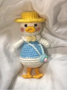Cute Little Duck Crochet Pattern: Amigurumi Doll with Blue Dress and Yellow Hat Tutorial