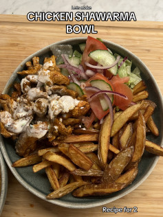 Delicious Chicken Shawarma Bowl Recipe with Crispy Fries, Fresh Salad, and Creamy Sauce