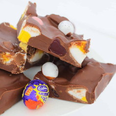 Easter Rocky Road with Cadbury Creme Eggs, Marshmallow Eggs and Raspberry Lollies