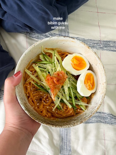 How to make Bibim Guksu: A quick and easy cold noodle dish with sliced cucumbers, soft-boiled eggs, and kimchi