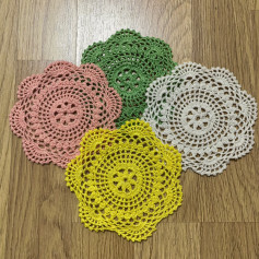 Mini Crochet Doilies Pattern: Intricate Lace Design in Pink, Green, White, and Yellow Yarn