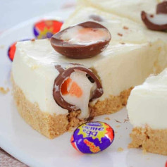 No-Bake Cadbury Creme Egg Cheesecake with White Chocolate Filling and Biscuit Base