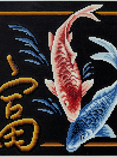 Pixel chart pattern for red and blue koi fish with gold calligraphy on black background