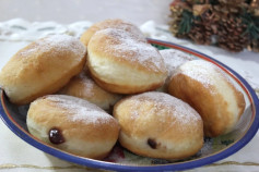 Posne krofne - Fried doughnuts with powdered sugar and jam filling