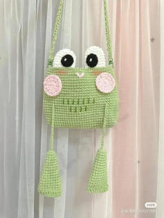 Solución de bolso de rana verde con mejillas rosas