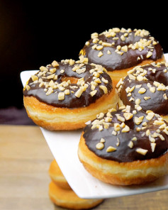 The Perfect Donut Recipe: Soft and Fluffy Chocolate Ring Donuts with Chopped Nuts