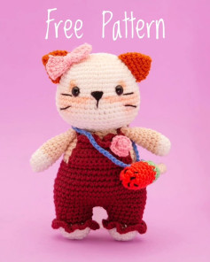 Free Crochet Pattern: Lilian the Kitty Amigurumi with Red Overalls and Strawberry Bag
