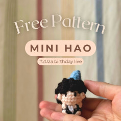 Free Crochet Pattern: Mini Hao Amigurumi Doll with Blue Party Hat
